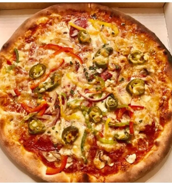 Overheerlijke versbereide pizza's bij Mamma Mia Pizzeria Rolde